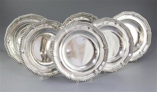 A rare and good set of six George IV silver soup plates, by Paul Storr, Diameter 245mm Total weight 108.5oz/3375grms